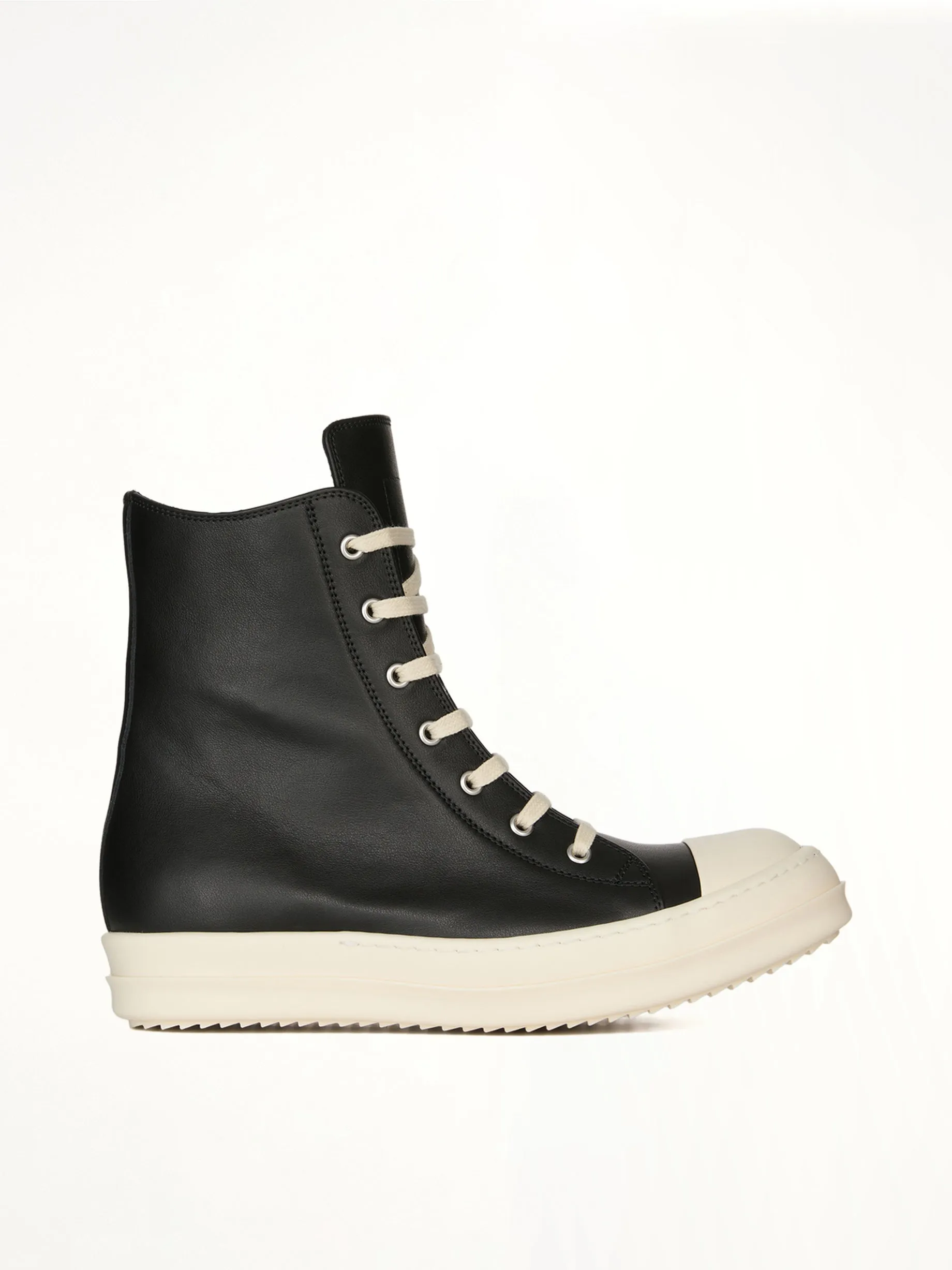 Sneaks in Black/Milk sold by MARAIS