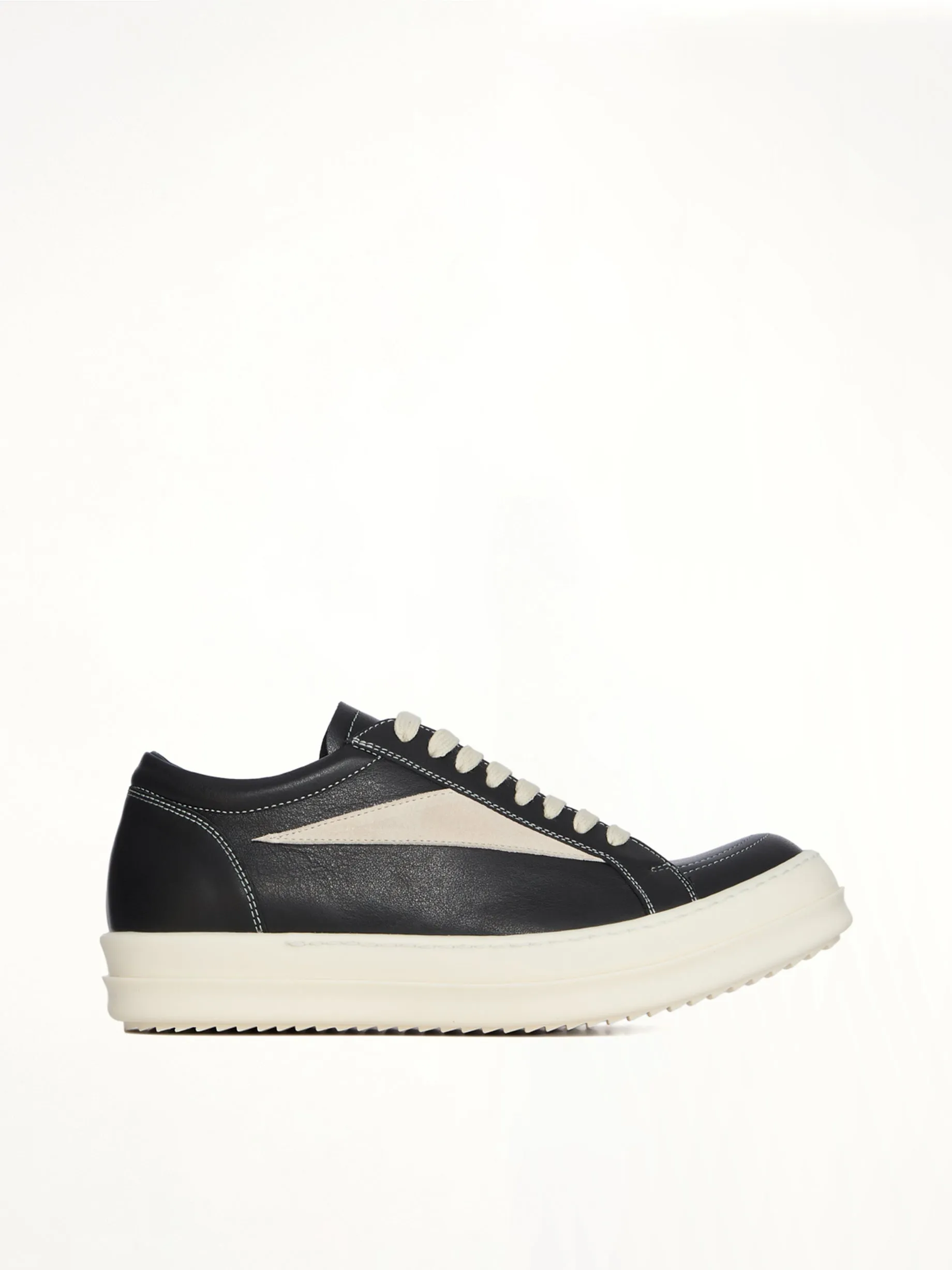 Vintage Calf Sneaks in Black/Milk sold by MARAIS