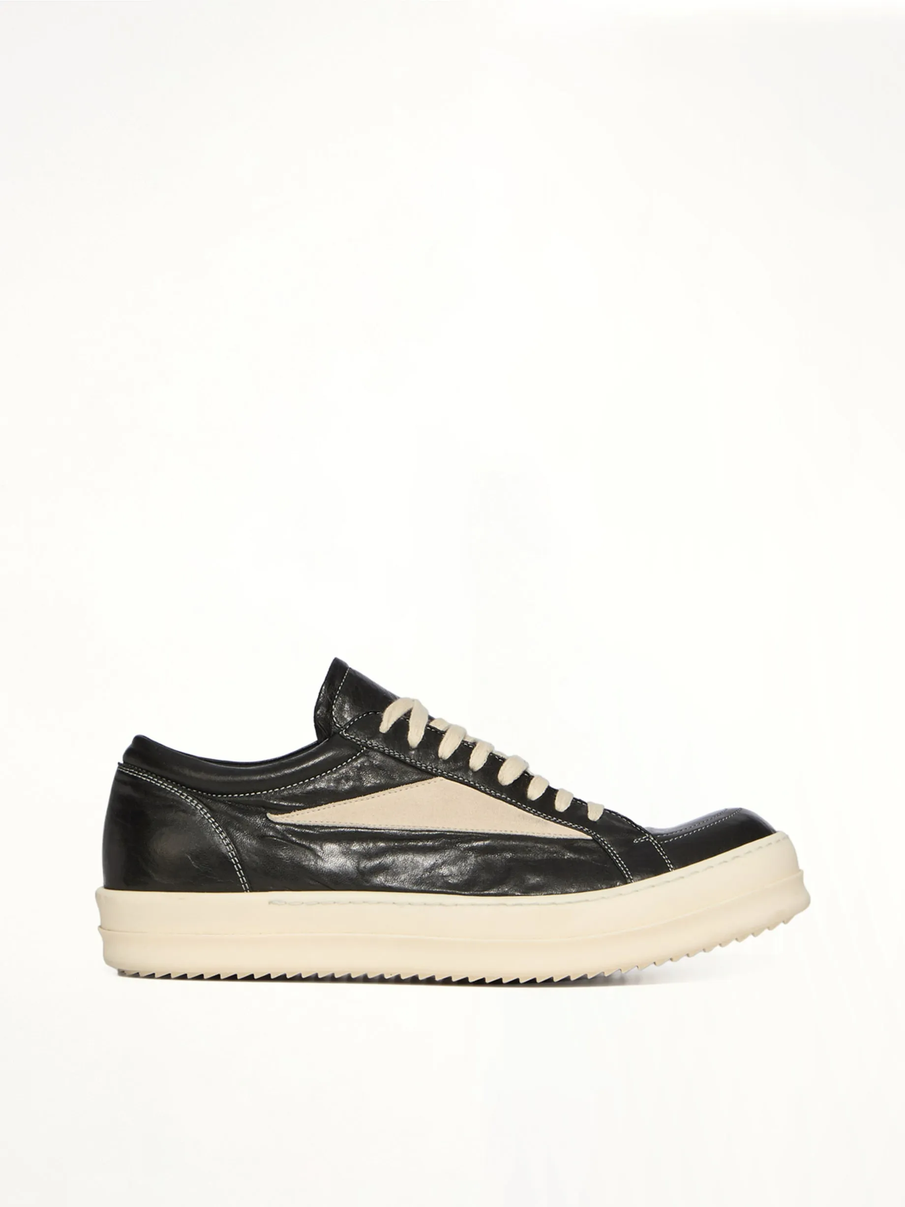 Vintage Lamb Sneaks in Black/Milk sold by MARAIS