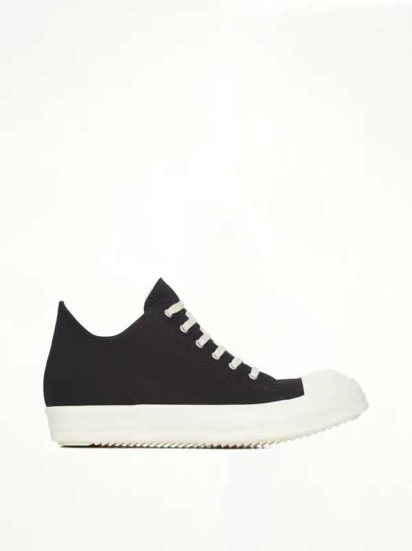Denim Low Sneaks in Black/Milk sold by MARAIS
