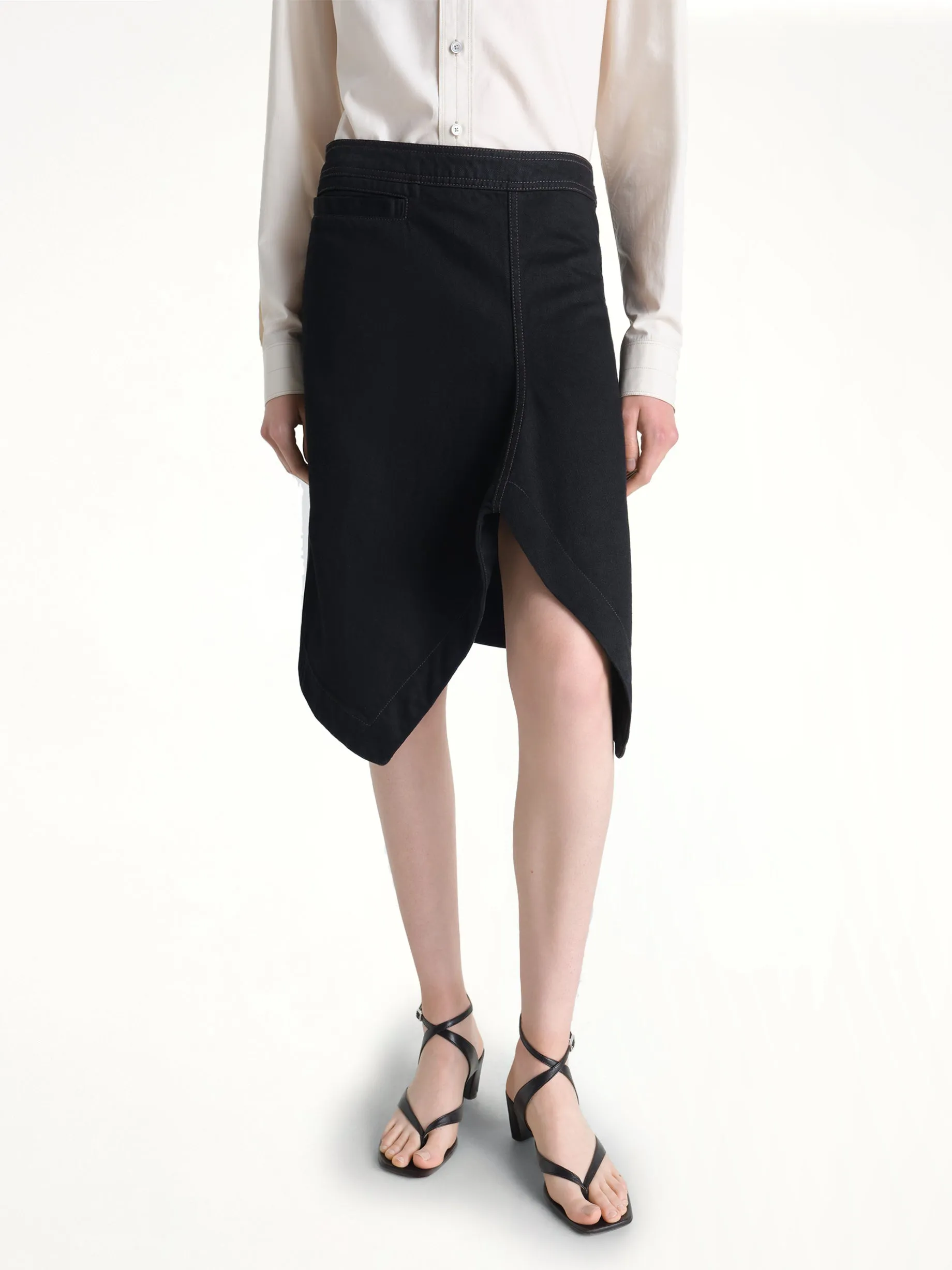 Asymmetric Short Skirt in Black sold by MARAIS