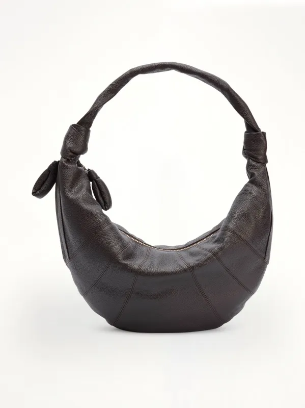 Grained Fortune Croissant Bag in Dark Chocolate sold by MARAIS