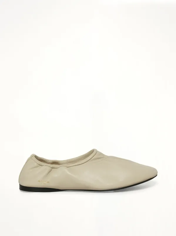 Supple Slippers in White made by Alaia