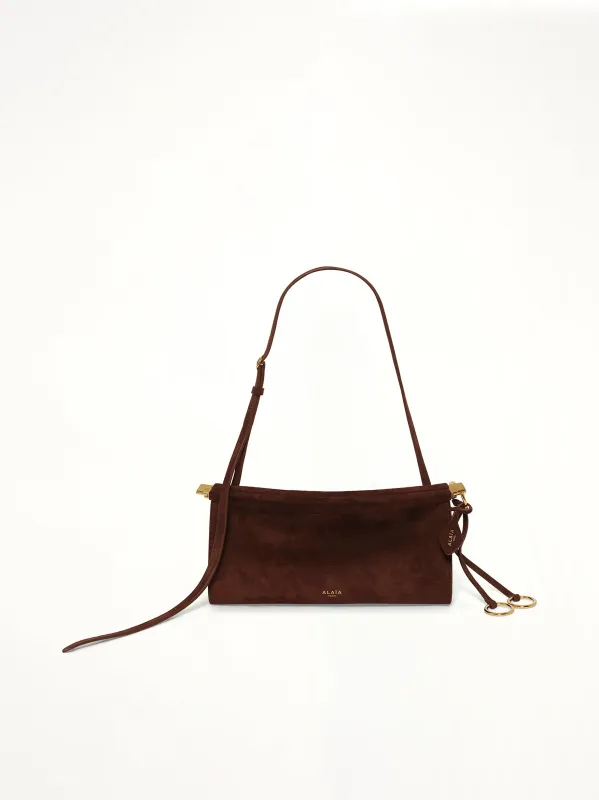 Le Click East West Small Bag in Brun Fonce made by Alaia