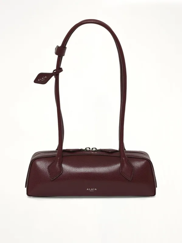 Le Teckel Small Bag in Rouge Grenat made by Alaia