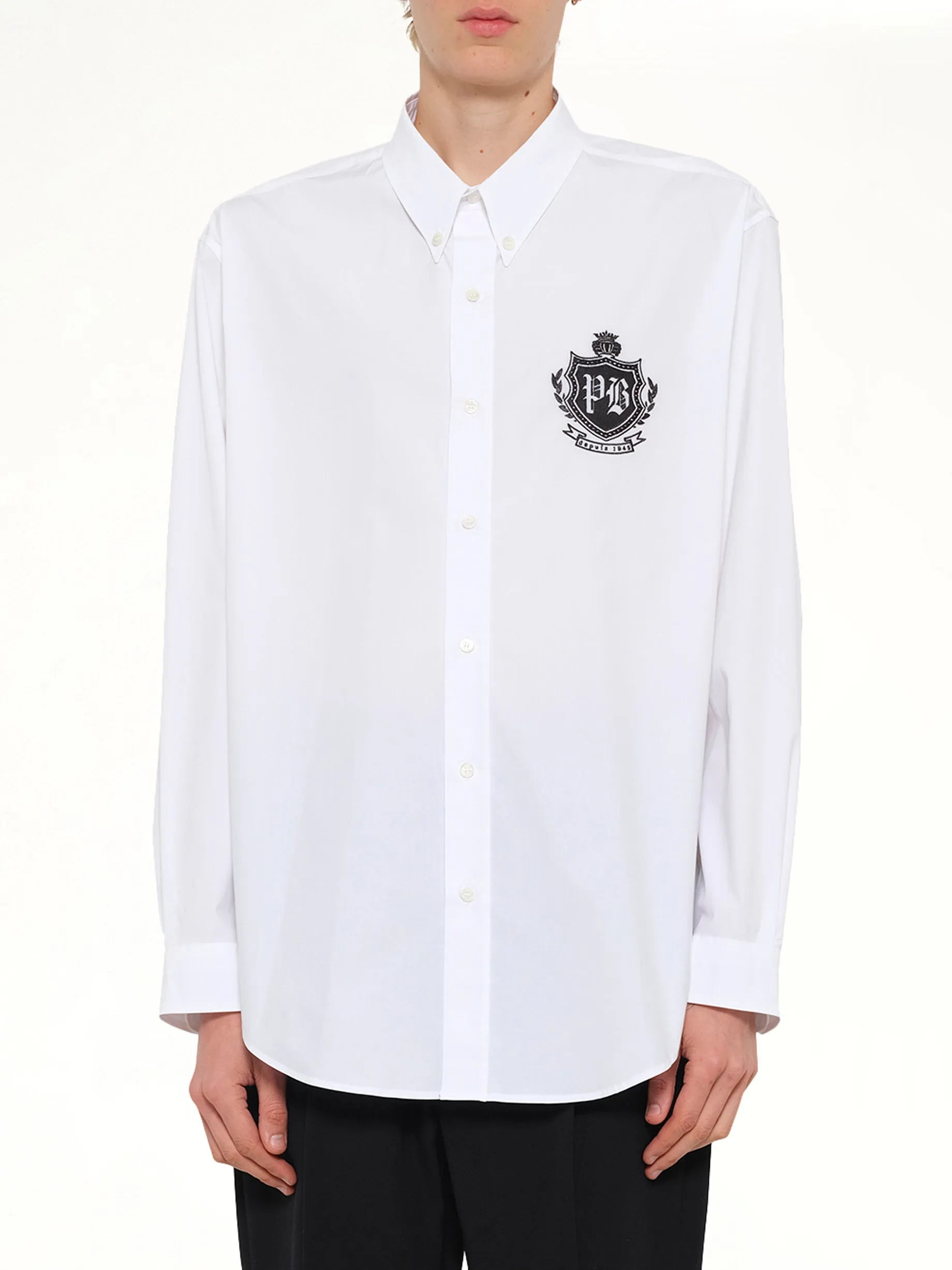 College Poplin Emblem Shirt in White sold by MARAIS
