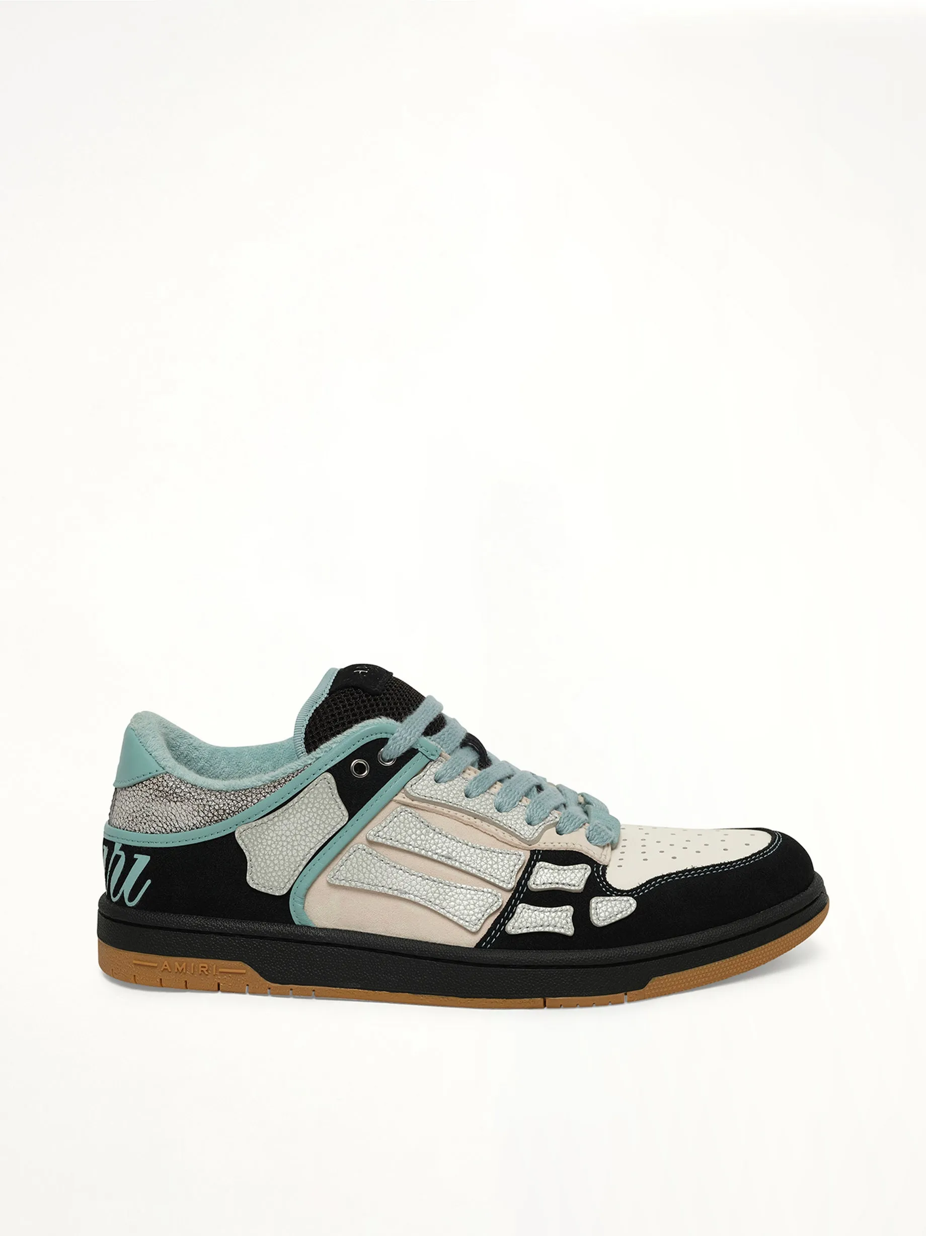 XL Skel Top Low Sneaker in Black sold by MARAIS