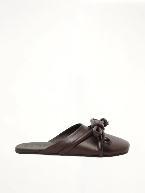 Flamenco Knot Mule in Dark Brownie sold by MARAIS
