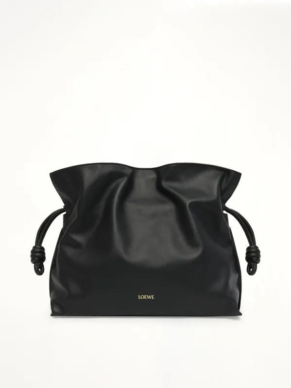 Flamenco Clutch Large in Black sold by MARAIS