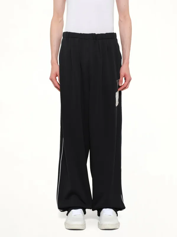 Amateur Sewn Track Pants in Black made by Maison MIHARA YASUHIRO