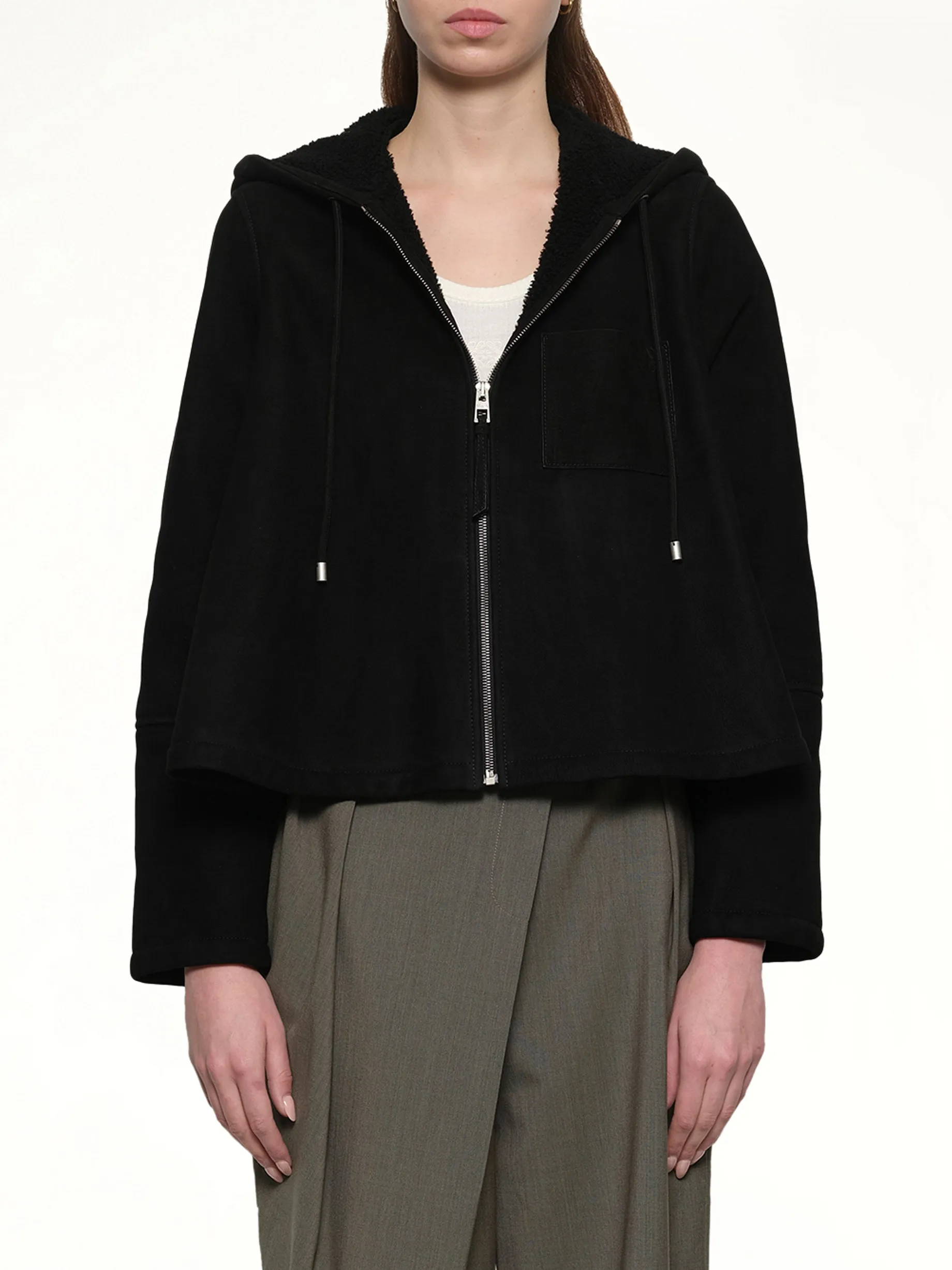 Hooded Shearling Jacket in Black sold by MARAIS