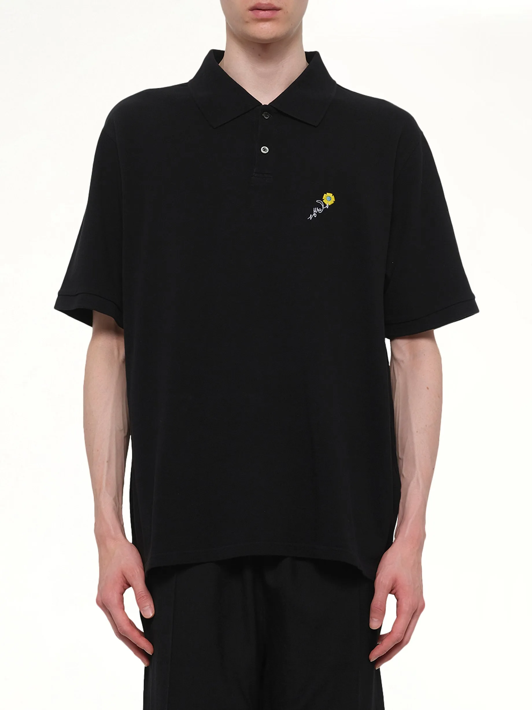 S/S Pique Polo in Black sold by MARAIS