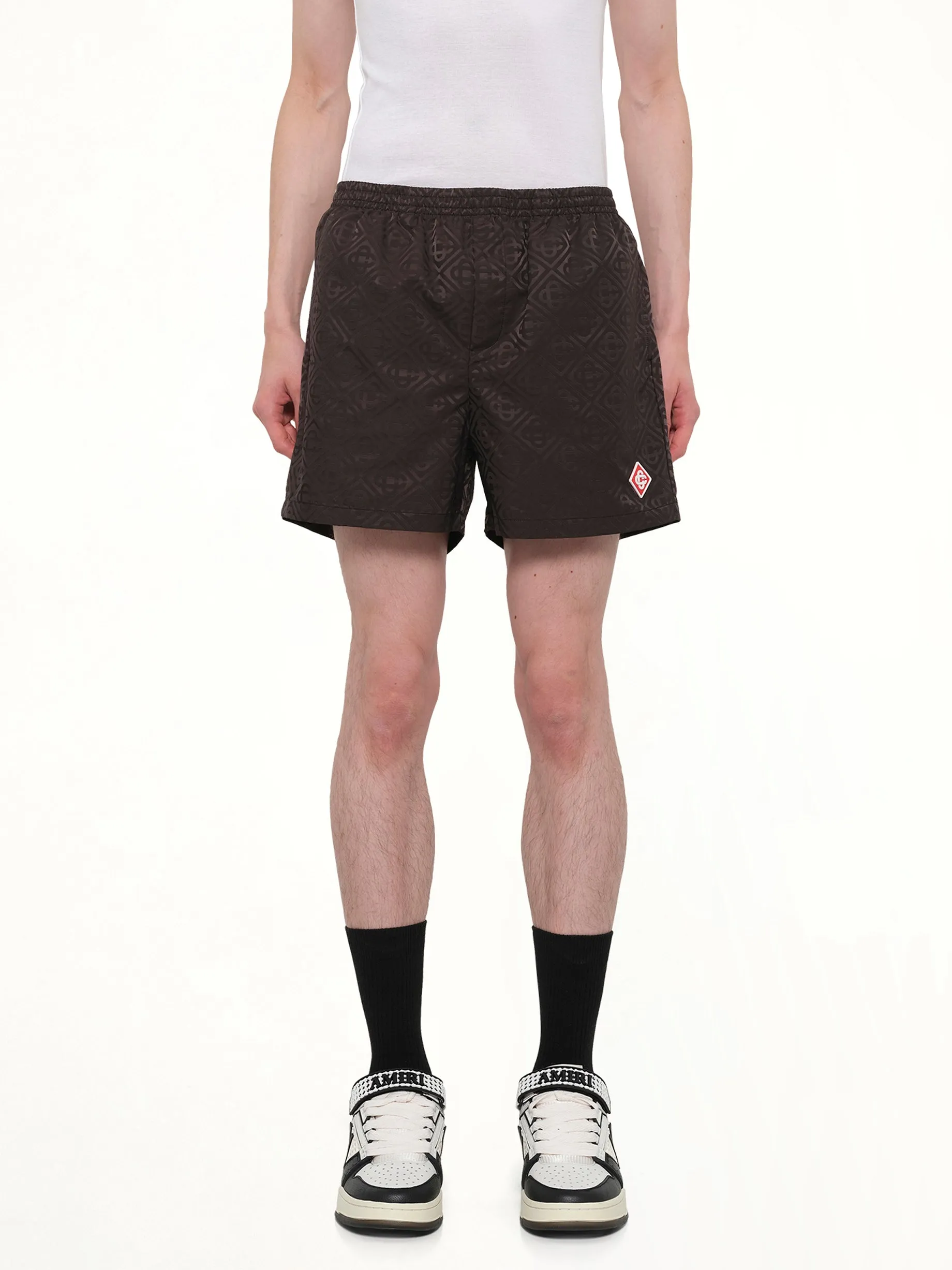 Jacquard Swim Shorts in Black sold by MARAIS