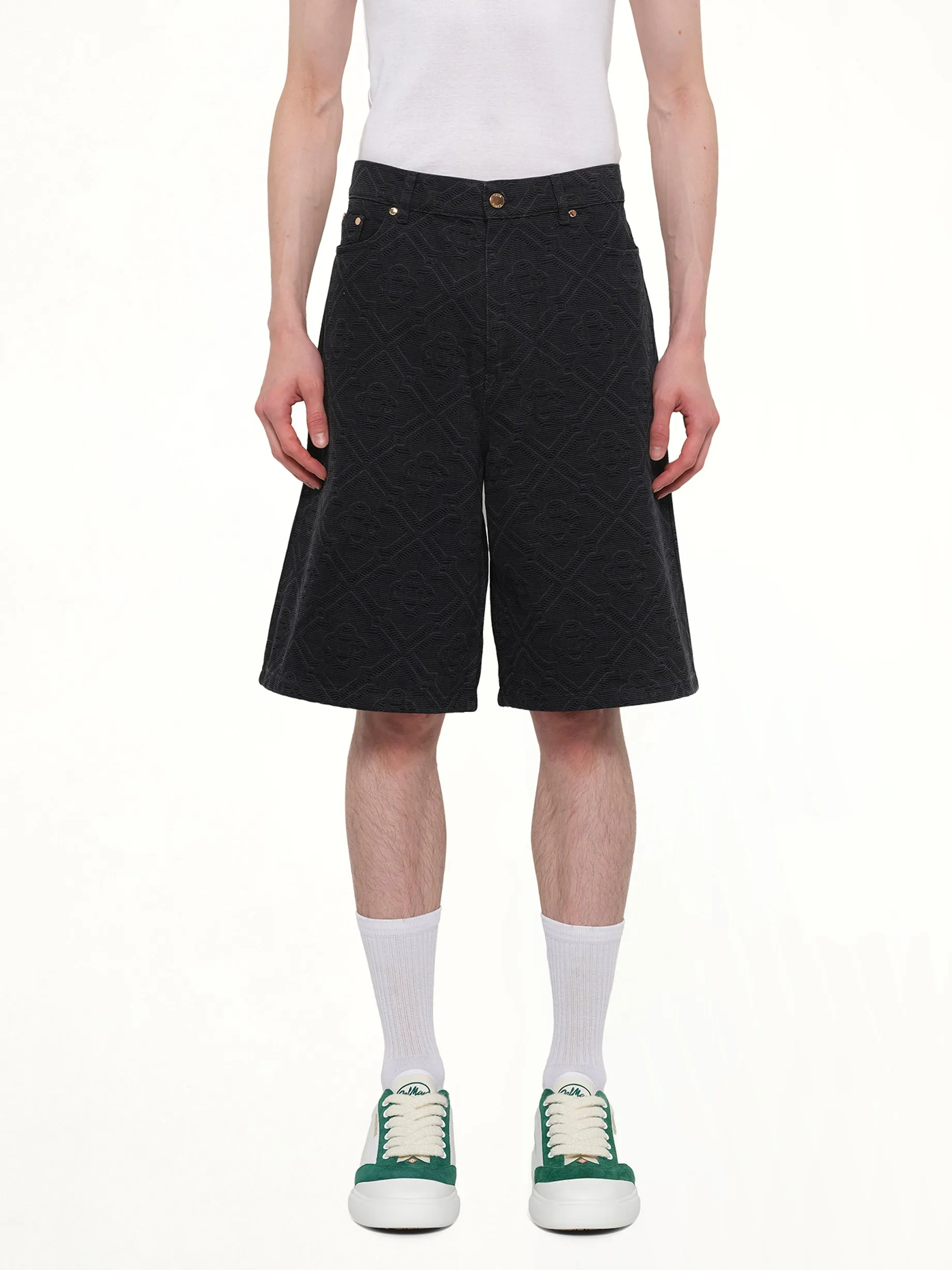 Laser Monogram Denim Shorts in Black sold by MARAIS