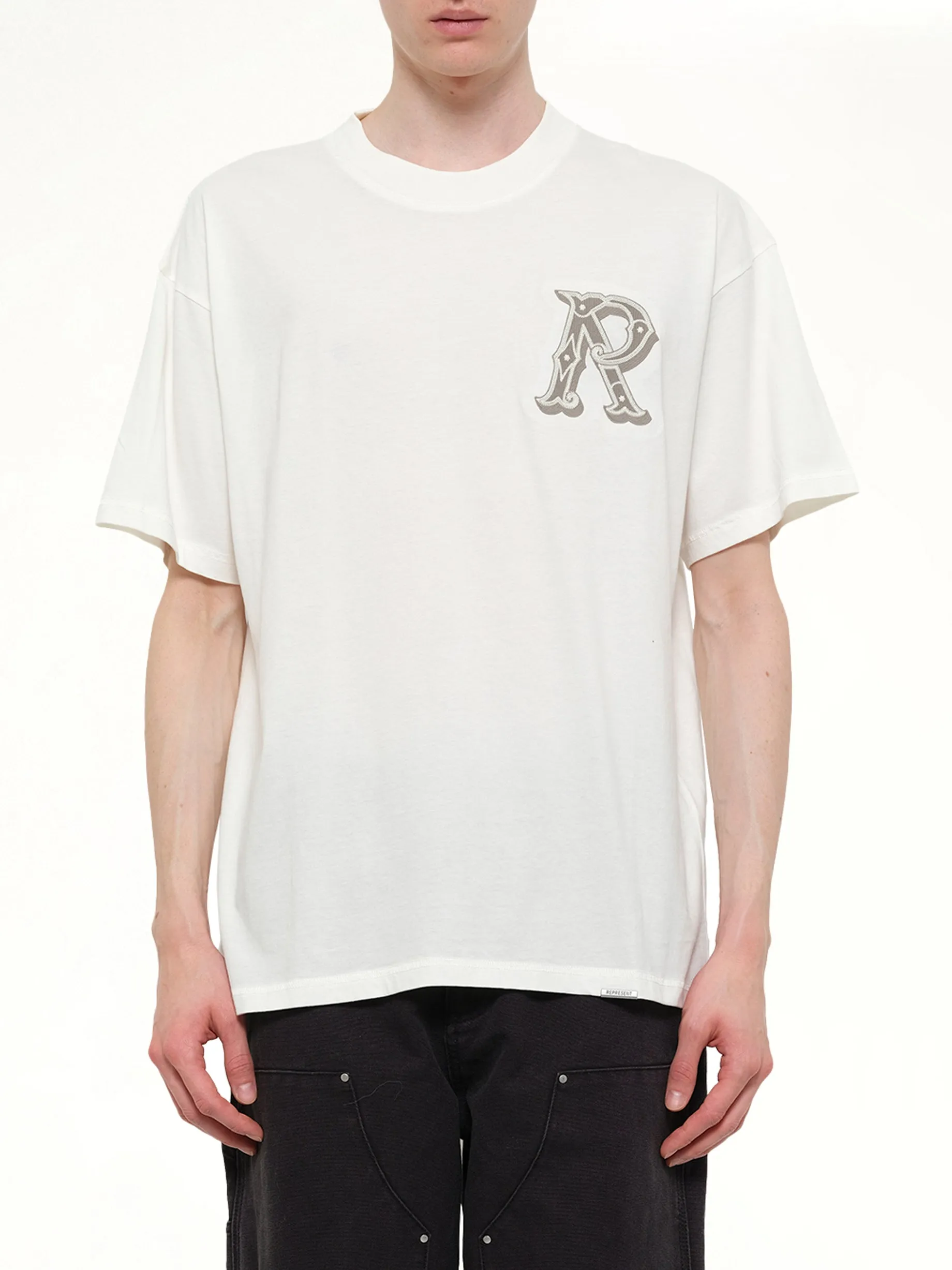 Western Initial T-Shirt in Flat White sold by MARAIS