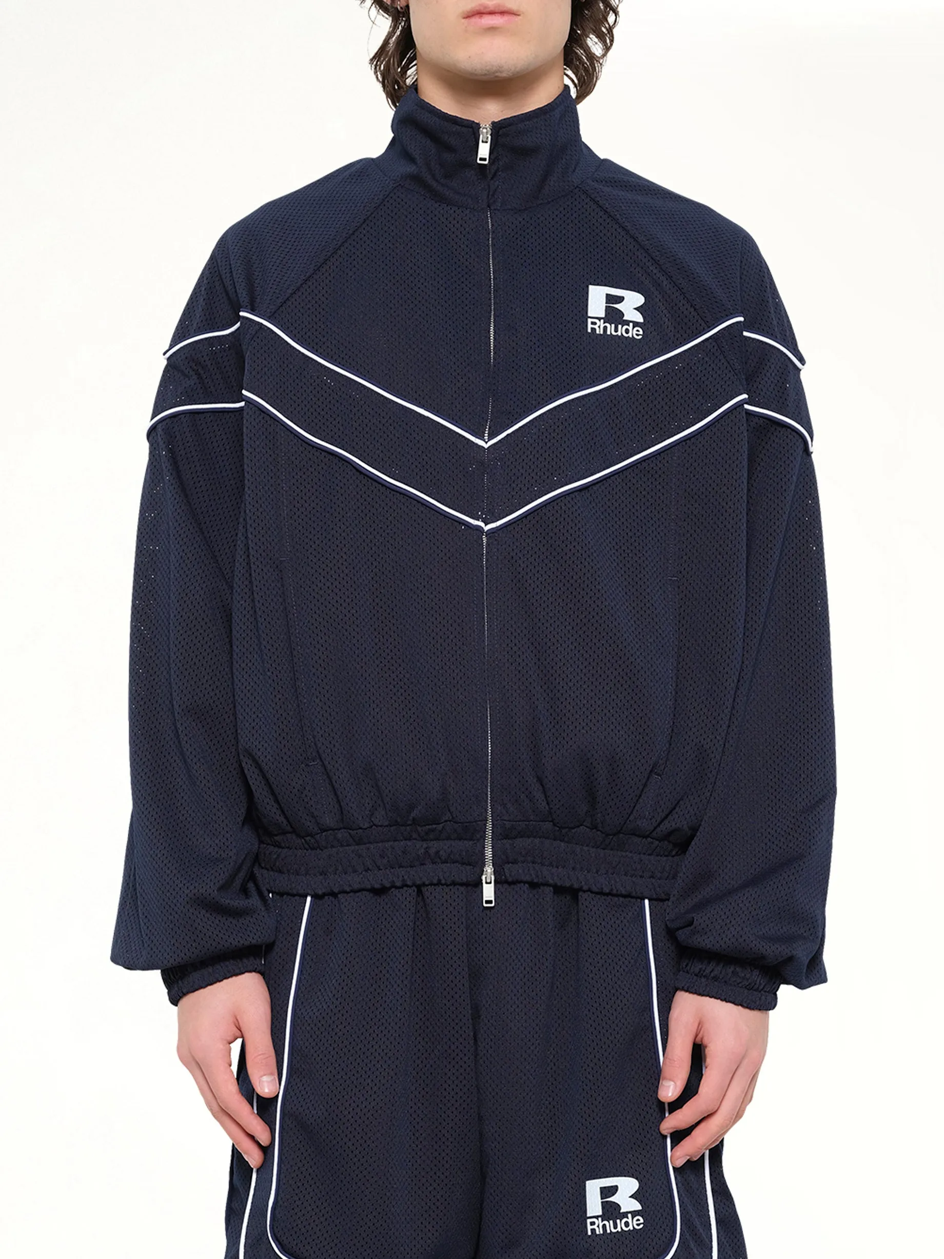 Rhude Mesh Piping Raglan Track Jacket in Navy/White sold by MARAIS