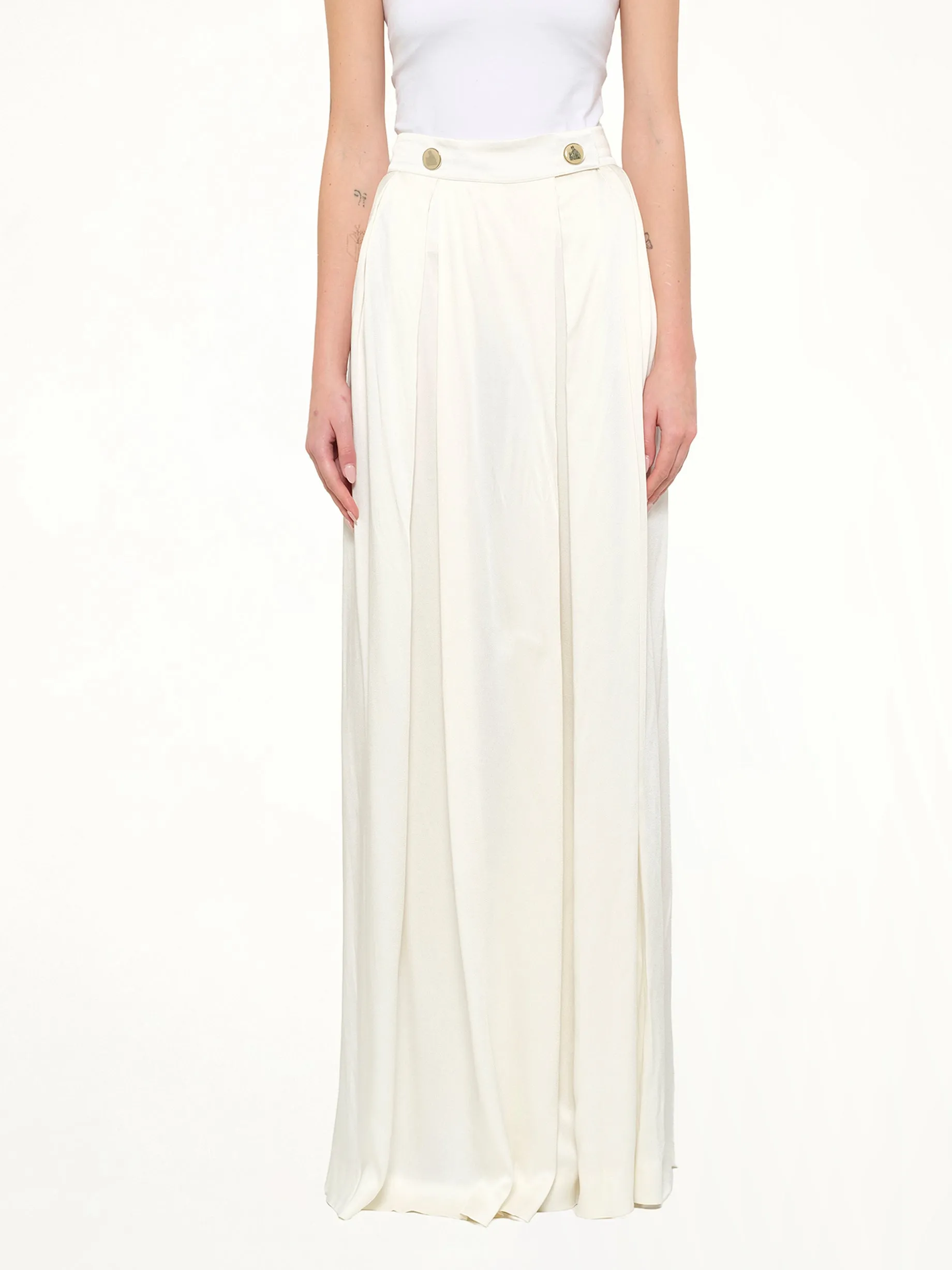 Pants in Cream sold by MARAIS