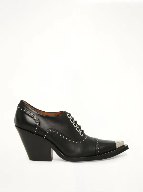 Cowboy Derby Shoes in Black made by Givenchy