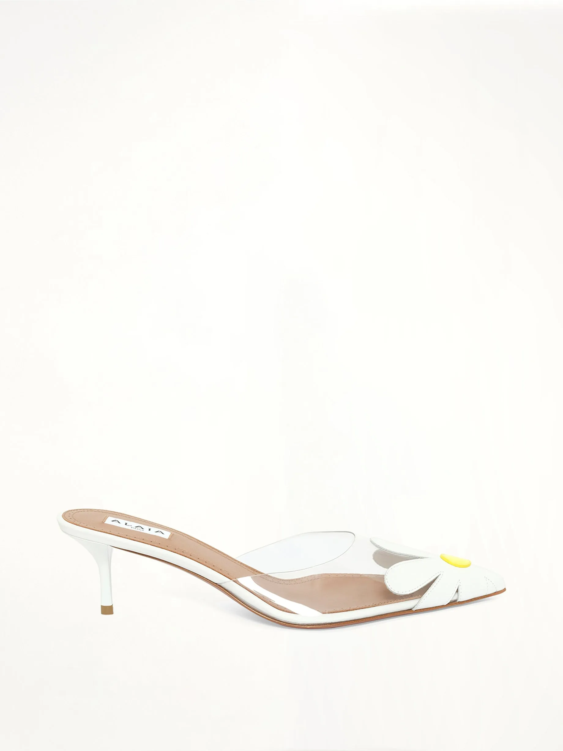 Bloom Mules in Lemon/White sold by MARAIS