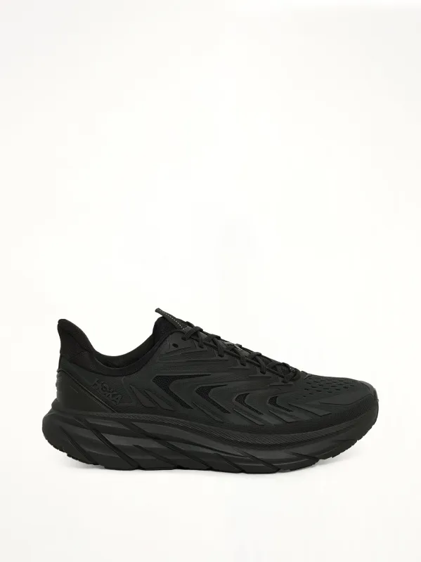 Clifton UTL Sneaker in Black made by Hoka
