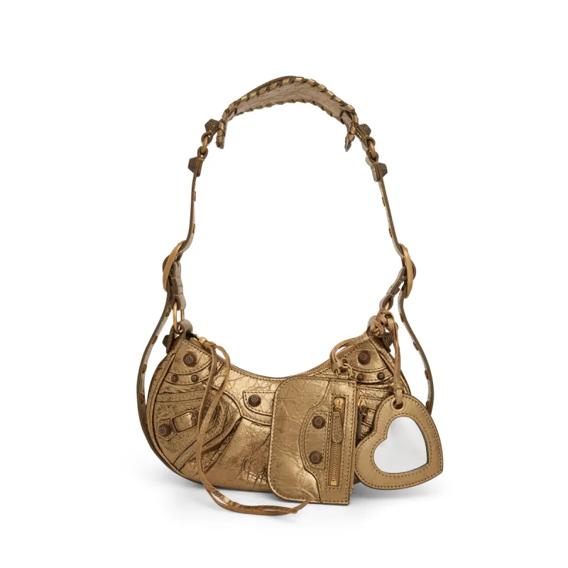 Le Cagole XS Shoulder Bag in Gold sold by MARAIS