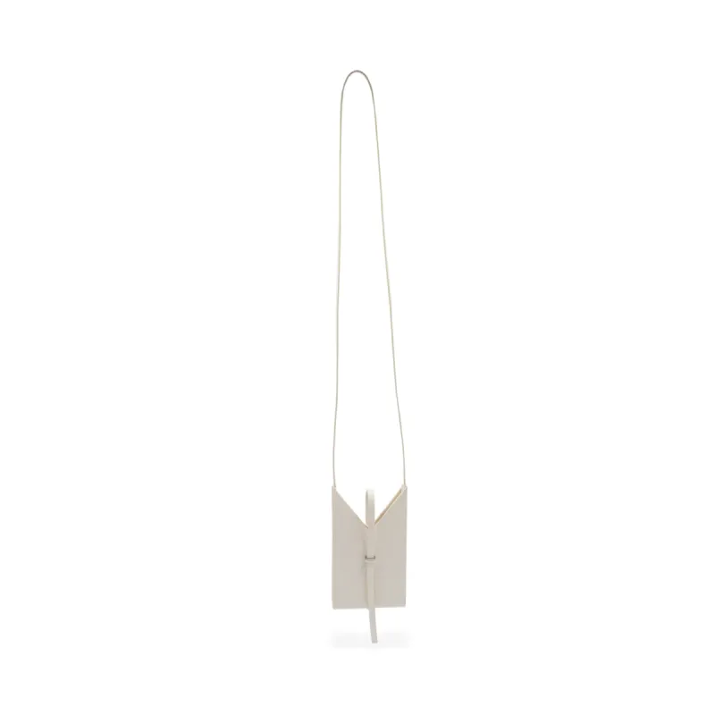 Cut Out Phone Pouch in Box Leather in Ivory sold by MARAIS