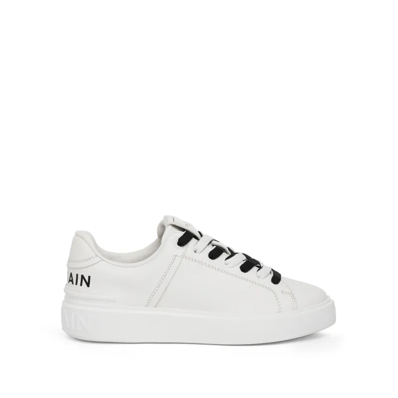 B-Court Calfskin & Logo Print Sneaker in White/Black sold by MARAIS