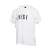 Amiri Core Logo T-Shirts in White sold by MARAIS