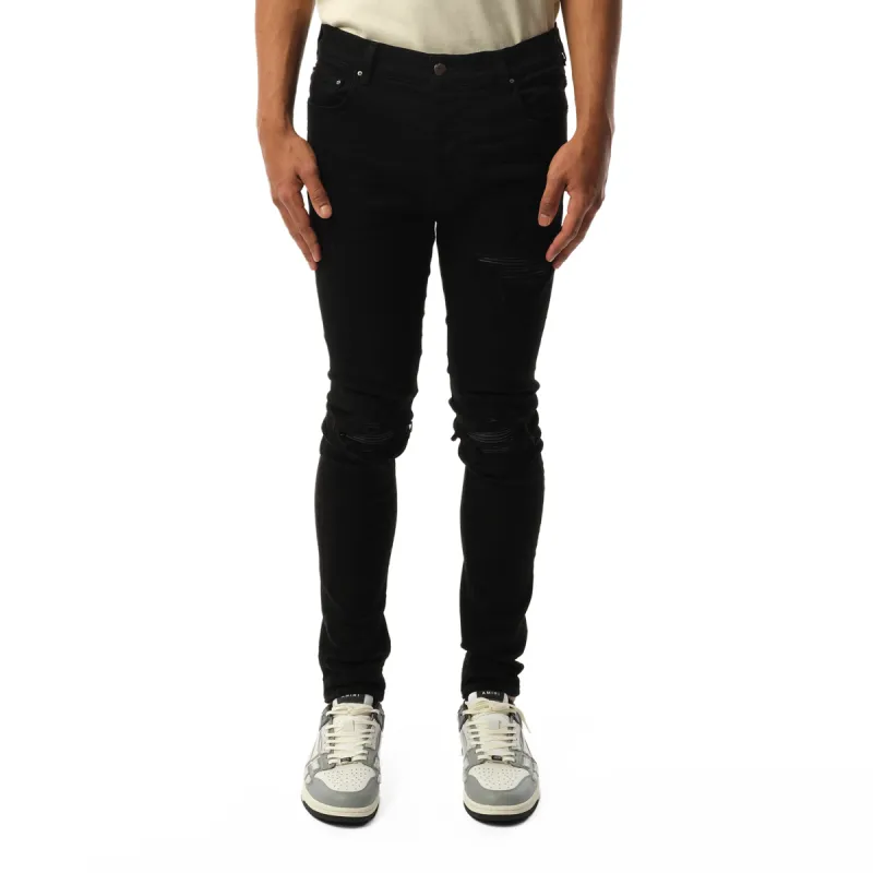 MX1 Distressed Jeans in Black sold by MARAIS