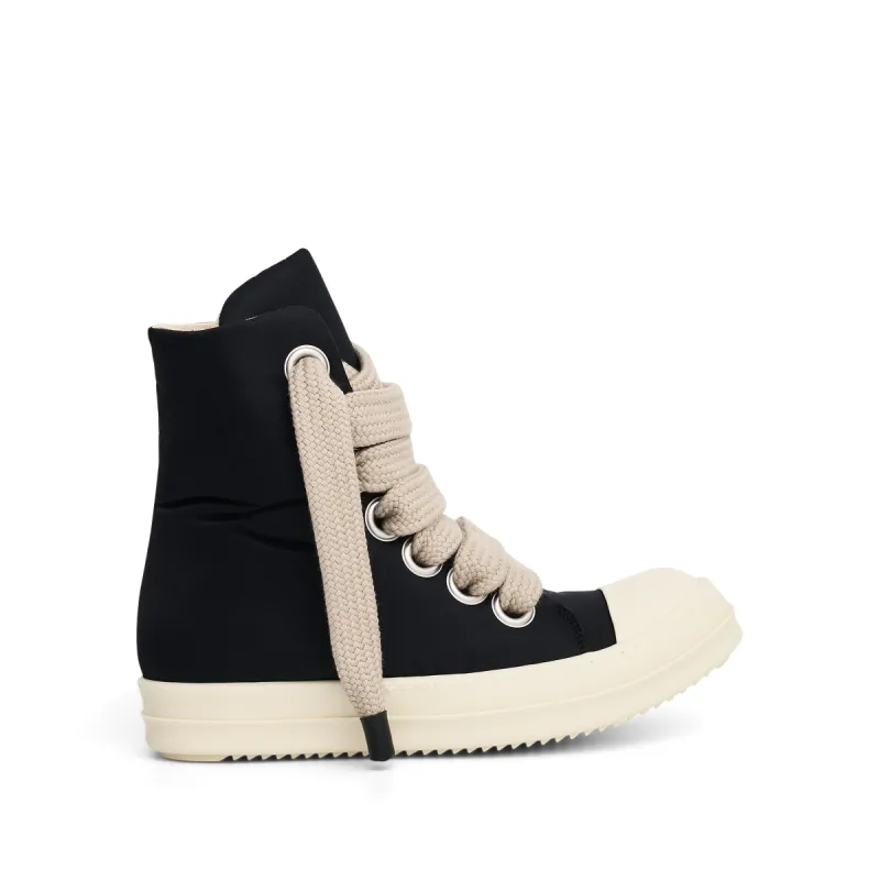 Jumbo Lace Puffer High Sneaker in Black/Pearl/Milk sold by MARAIS