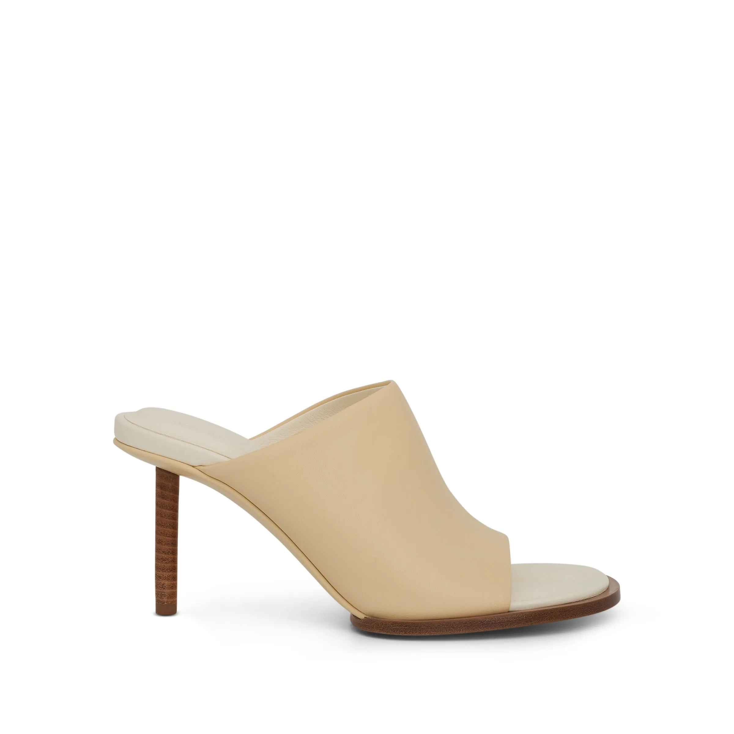 Carre Geometric Mules in Off White sold by MARAIS