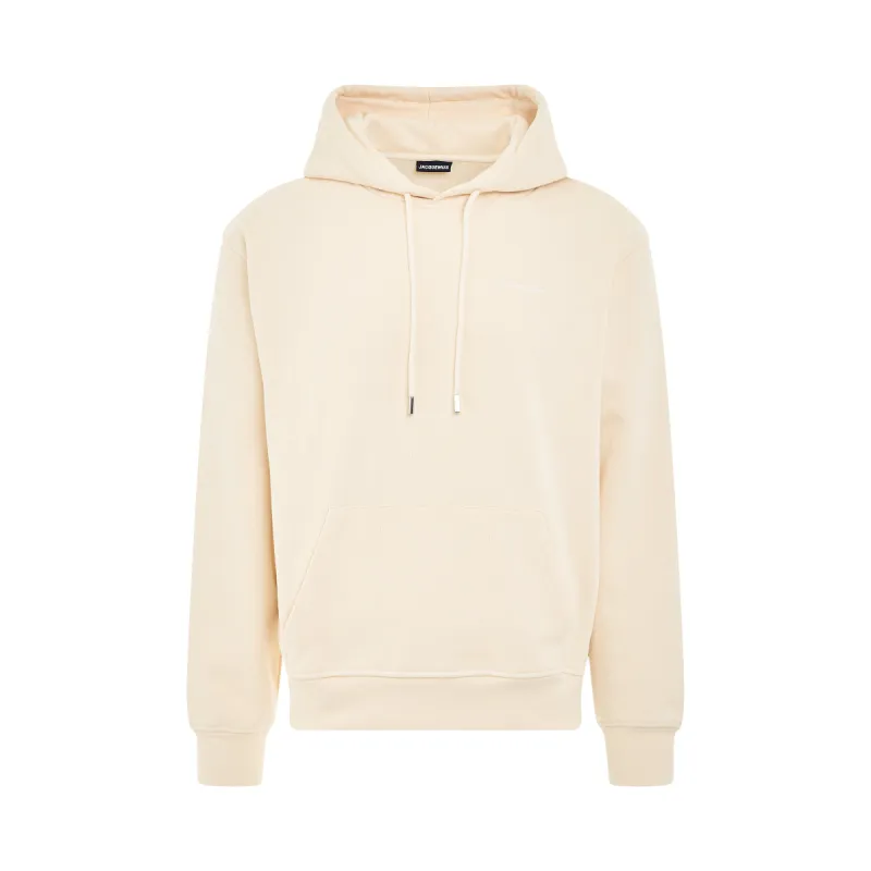 Brode Embroidered Logo Hoodie in Beige made by Jacquemus