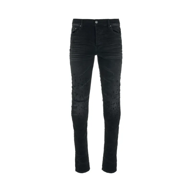 Shotgun Skinny Jeans in Faded Black made by AMIRI