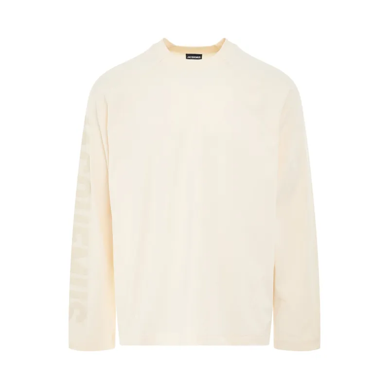 Typo Logo Long Sleeve T-Shirt in Light Beige sold by MARAIS