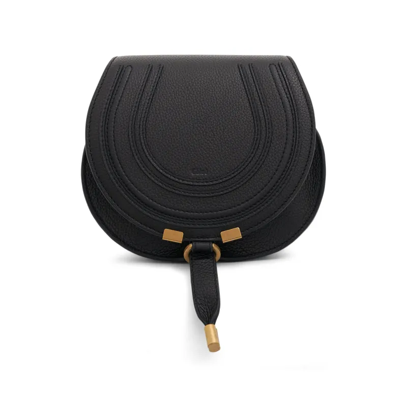 Small Marcie Saddle Bag in Black sold by MARAIS