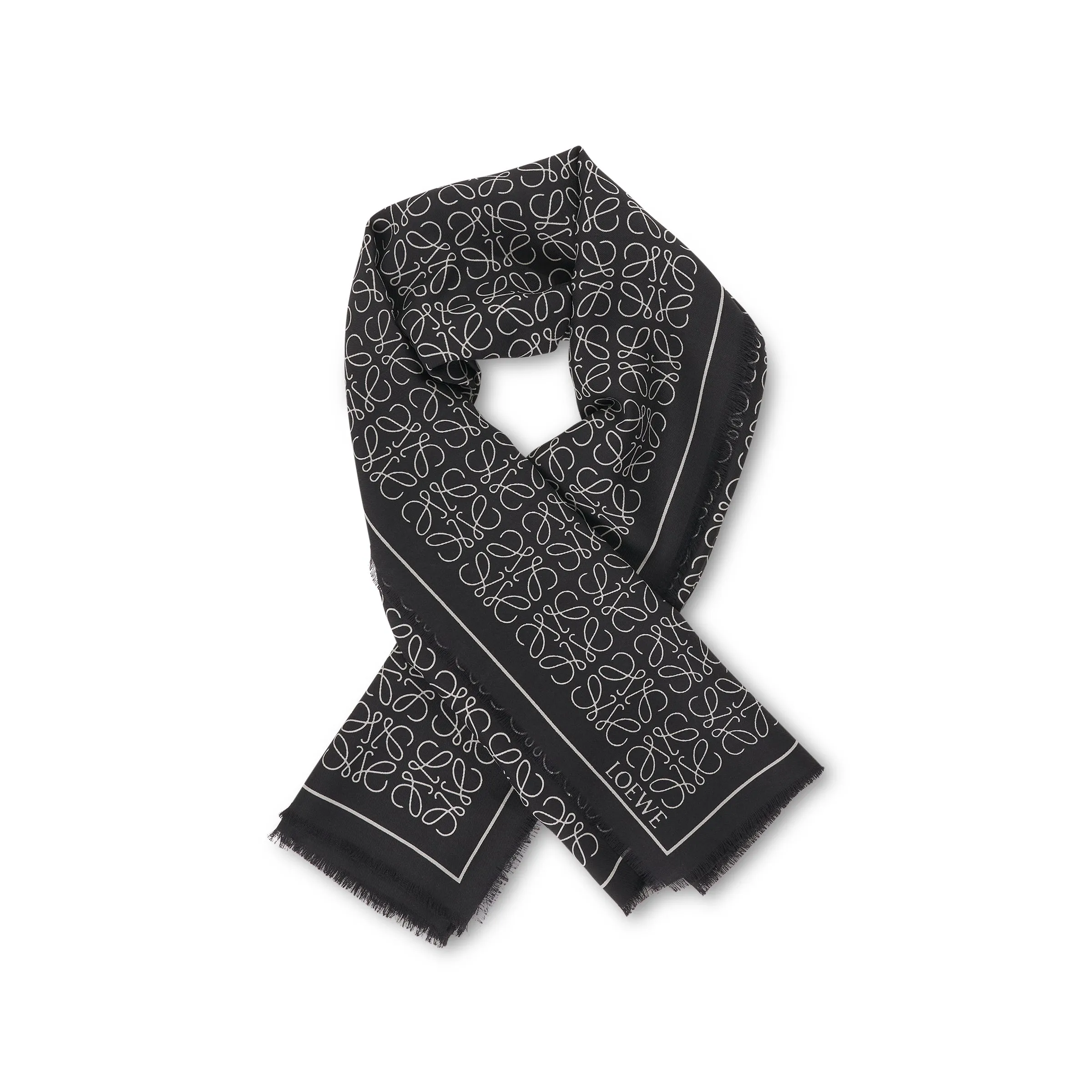 Anagram Wool and Silk Scarf in Black sold by MARAIS