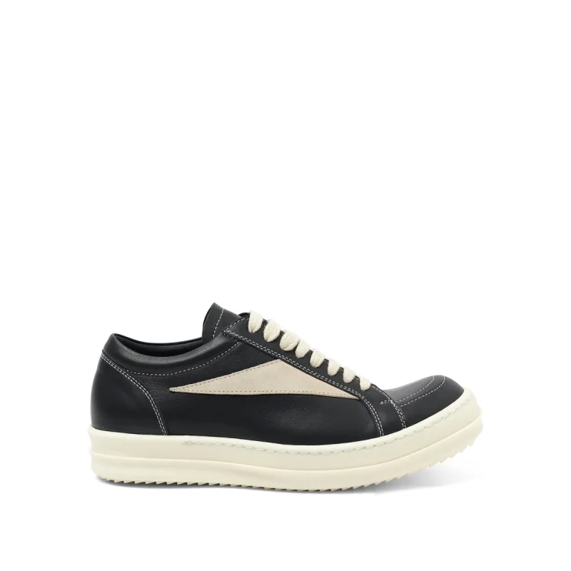 Full Grain Leather Vintage Sneaker in Black/Milk sold by MARAIS