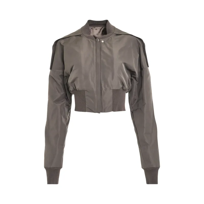 Collage Bomber Jacket in Dust sold by MARAIS