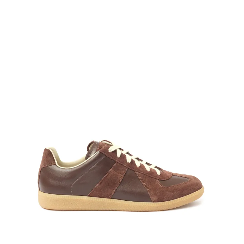 Replica Leather Sneaker in Chic Brown sold by MARAIS