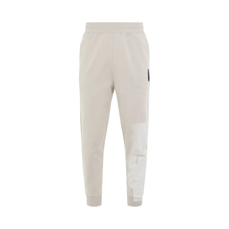 Brushstroke Painted Sweatpants in Bone sold by MARAIS