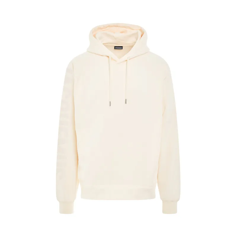 Typo Logo Hoodie in Light Beige sold by MARAIS