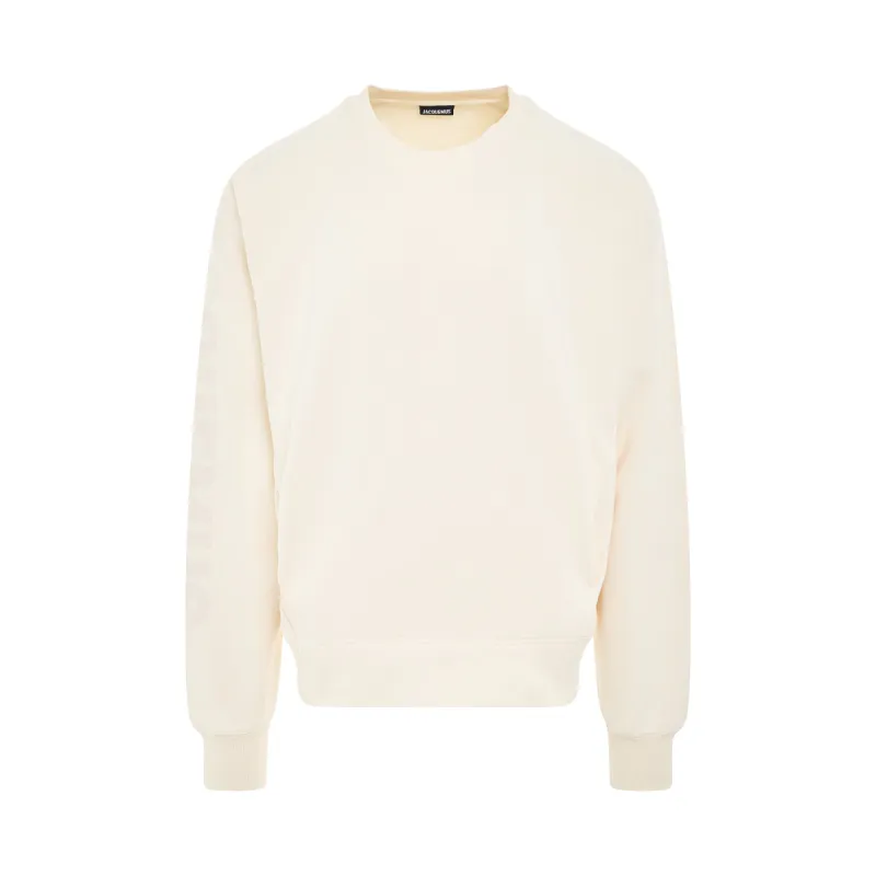 Typo Sleeve Logo Sweatshirt in Light Beige sold by MARAIS