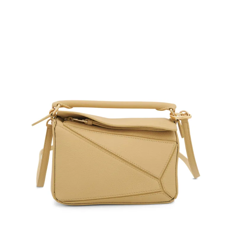 Mini Puzzle Bag in Soft Grained Calfskin in Dark Butter sold by MARAIS
