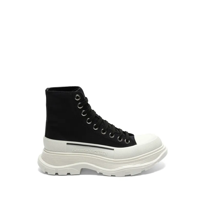 Tread Slick Canvas Lace-Up Boots in Black/White sold by MARAIS