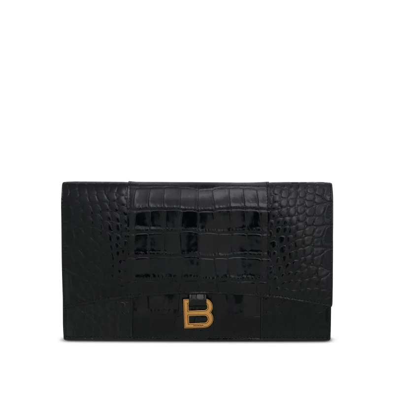 Hourglass Flat Pouch With Flap in Black sold by MARAIS