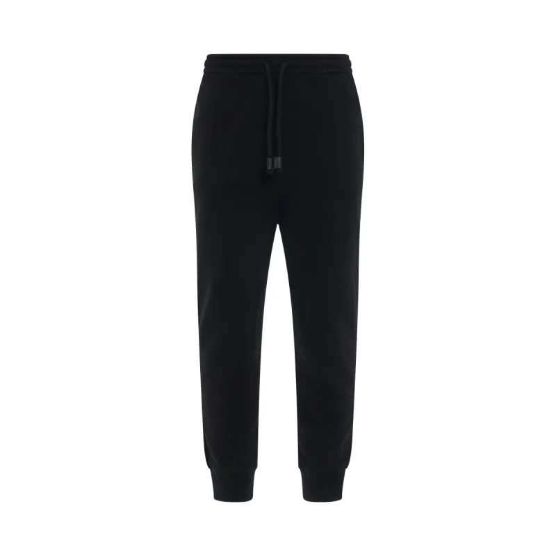 Anagram Jogging Pants in Black sold by MARAIS