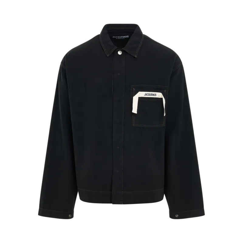 La Chemise De-Nimes Denim Shirt in Black/Brown sold by MARAIS