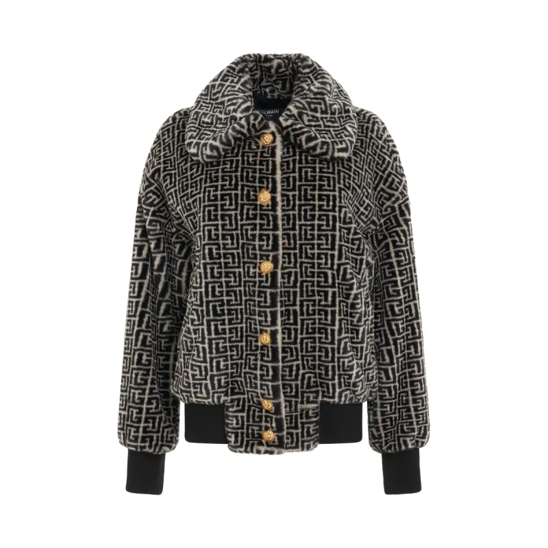 Buttoned Monogram Faux Fur Bomber Jacket in Ivory/Black sold by MARAIS
