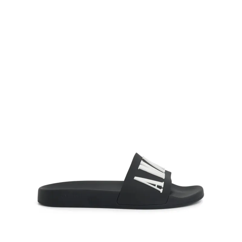 Logo Pool Slide in Black made by AMIRI