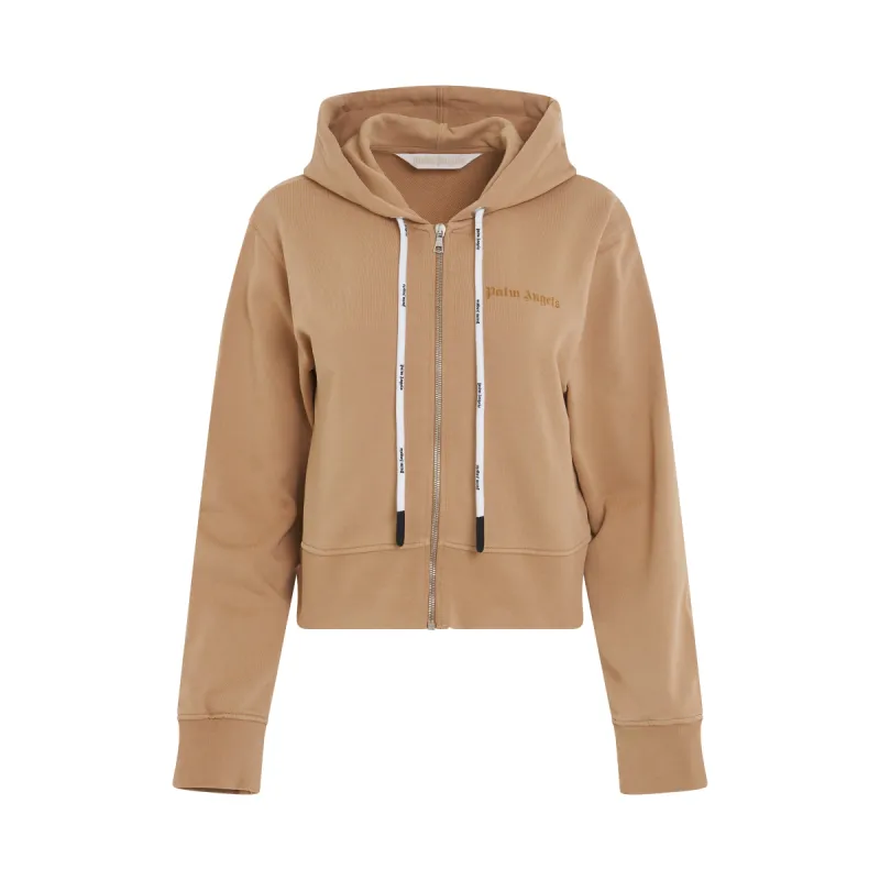 GD Reversed Logo Zip Fit Hoodie in Beige sold by MARAIS